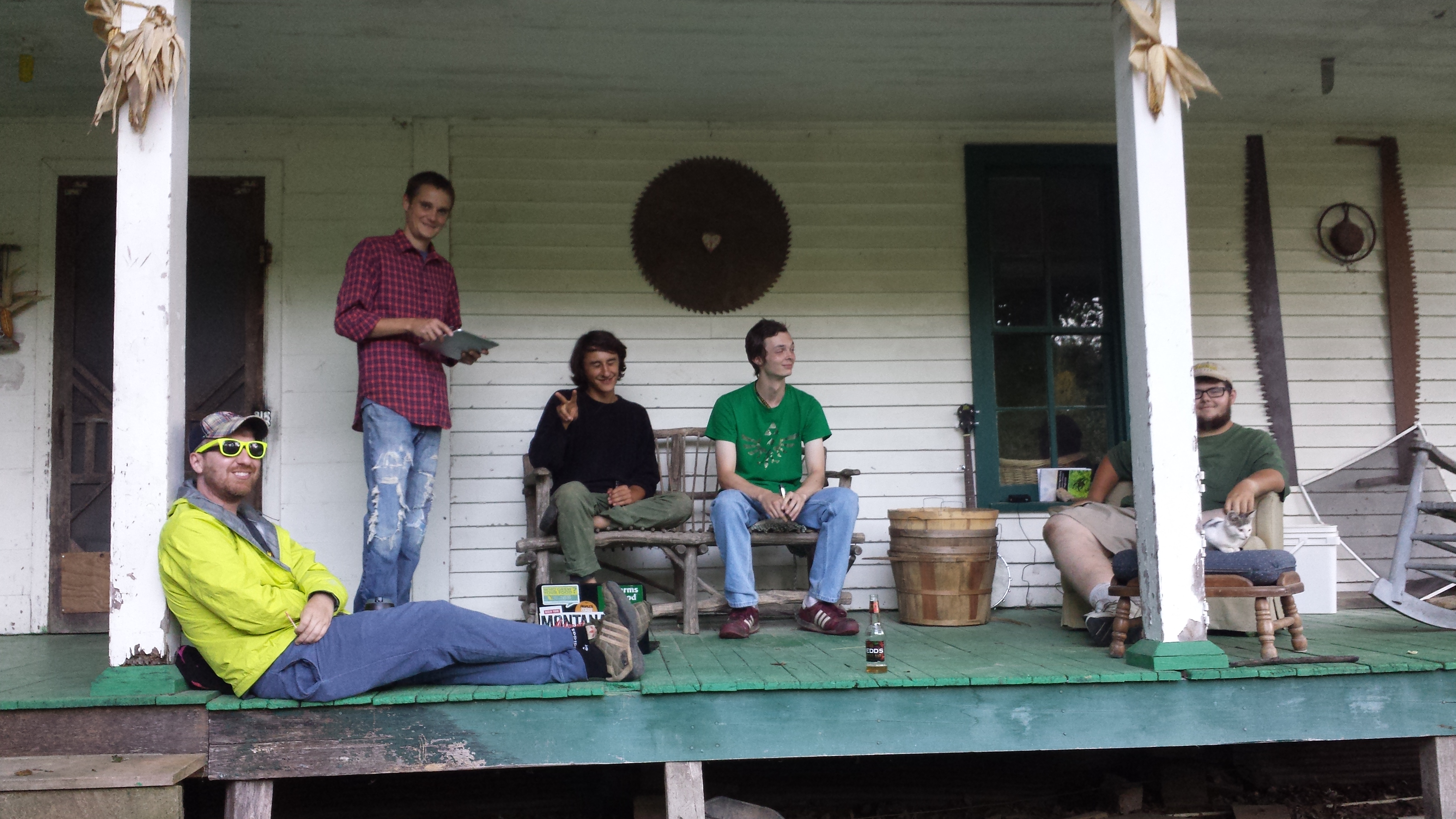 farm life boys front porch sitting after long day
