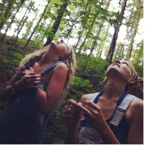 kristina Rossi and Olivia Cantrell looking up at the trees